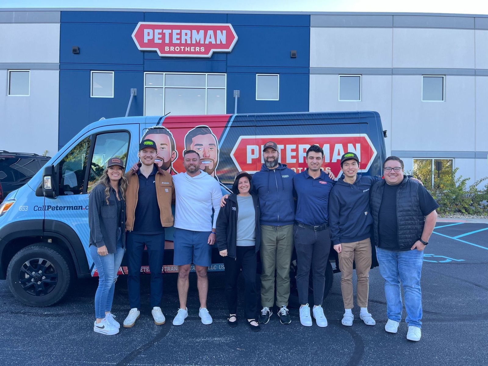 The Probook team in front of a Peterman Brothers van
